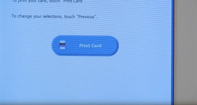 White voting machine screen with blue button reading "Print Card"