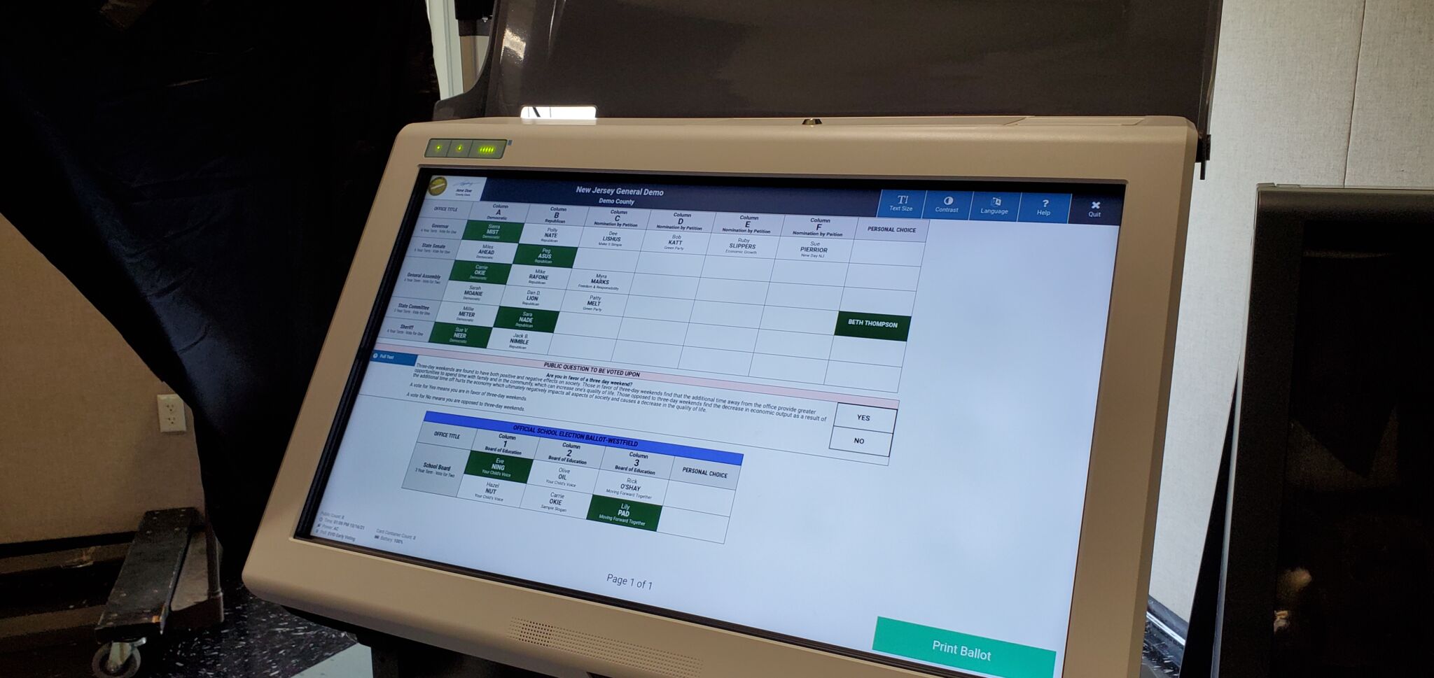 White ExpressVote XL voting machine screen showing some selections made